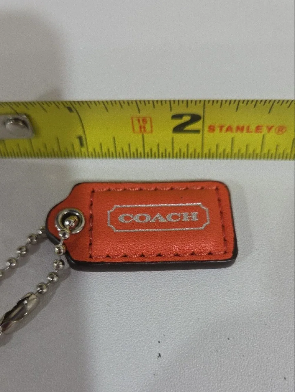 COACH Orange Leather Mini Hang  Tag  with Silver Ball Chain